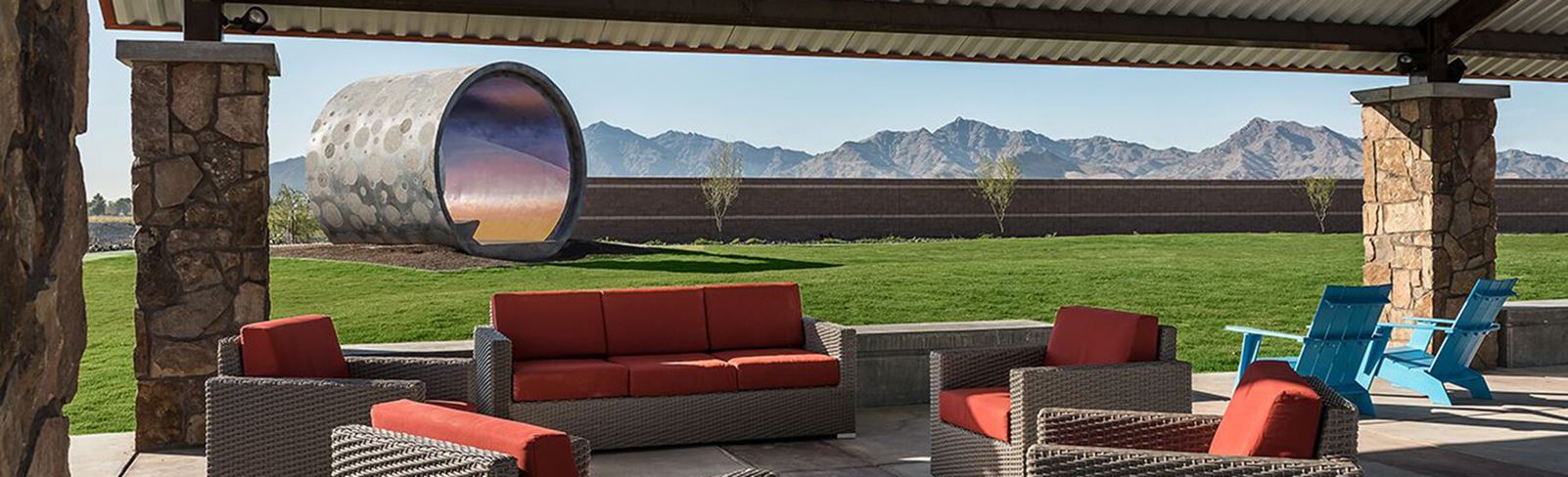 Starlight Pass Park seating area with art structure at Alamar community in Avondale, Arizona